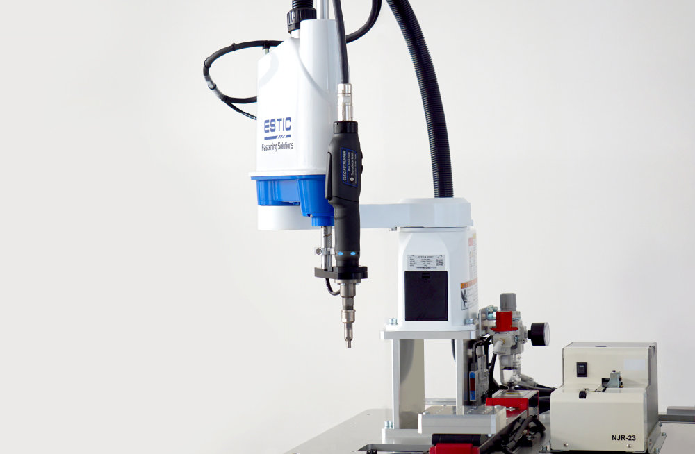 This is an image of Estic's SCARA robot with a micro tool.